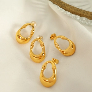 French vintage style irregular geometric gold fluid earrings with high polish finish