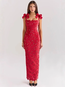 Elegant red lace maxi dress featuring oversized shoulder bows and a slim fit silhouette