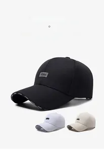 Detailed view of adjustable baseball caps in black, white, and beige with FEWK patch labels
