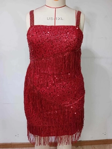 Detail of red sequin tassel dress with 1XL size marking on a female mannequin