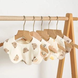 Five-pack set of petal-shaped cotton gauze baby bibs with cute brown bear and rainbow prints