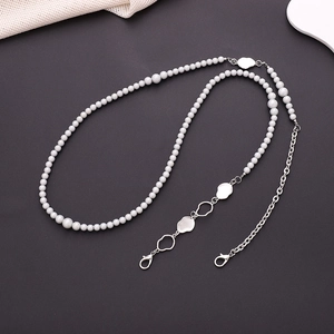 Handmade crossbody phone strap with white faux pearls and silver metal chain detail