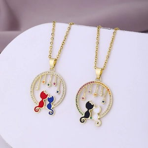 Matching cat pendant necklaces with colorful cats and zircon stars on gold chains