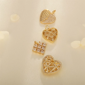Golden micro-paved heart and square zircon charms on elegant silk with flower petals