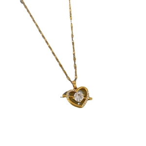 Elegant gold titanium heart necklace with arrow design and sparkling crystal inlay
