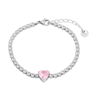 Detailed macro view of silver tennis bracelet with pink heart zircon in stainless steel