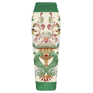 Detail of high-waisted midi skirt with classical vase print and green decorative borders