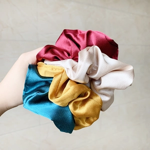Set of 4 elegant satin scrunchies in burgundy, champagne, green and yellow tones