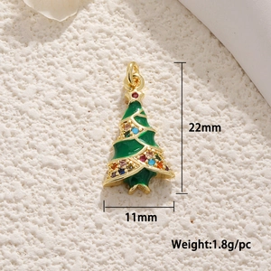 Detailed view of enamel Christmas tree pendant with 22mm height and 11mm width dimensions