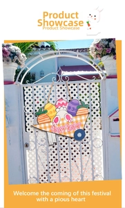 Close-up of Happy Easter wooden cart sign with eggs and rabbits on white fence