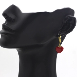 Elegant gold hoop earrings featuring vibrant red 3D heart pendants for women