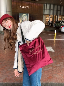 Retro burgundy velvet tote bag with gold letter embroidery for chic urban style