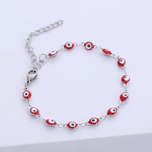 Silver stainless steel bracelet featuring twelve red evil eye charms with an extender chain