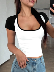 Side view of white Y2K slim fit t-shirt with black contrast trim and deep U-neckline