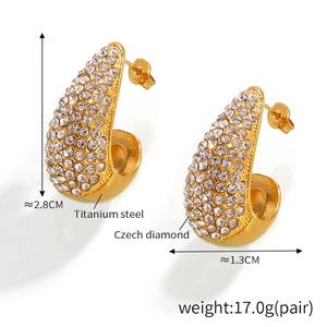 Detail view of water drop earrings with PVD 18K gold plating and cubic zirconia