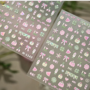 Detailed view of M-1143 3D embossed nail art stickers with bow and fruit patterns