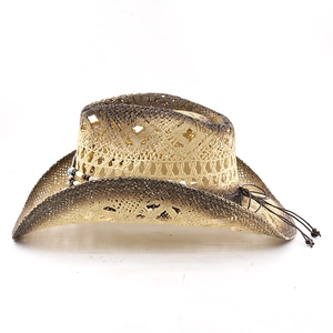 Detail of a straw cowboy hat featuring bullhead beads and vintage spray-painted edges