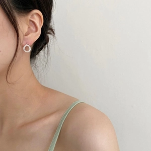 Minimalist S925 sterling silver triple hoop earrings worn on a female model side profile