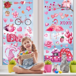 Valentine's Day gnome window clings set with pink hearts and LOVE flamingo decorations
