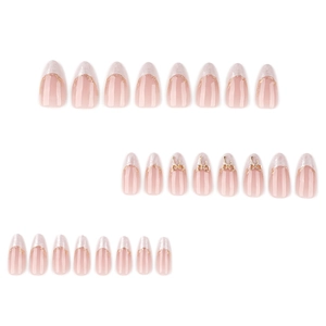 Pink almond press-on nails with white marble French tips and gold 3D bow charms
