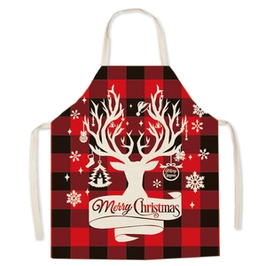 Red and black plaid Christmas apron with reindeer silhouette and Merry Christmas text