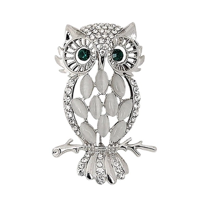 Fashionable owl brooch with silver alloy, green eyes, and white cat eye stones in detail