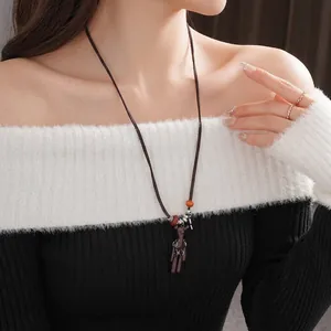 Brown bear pendant necklace with long cord, retro style accessory for women sweaters