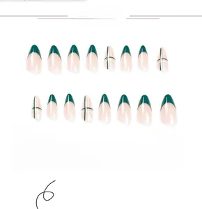 Detail view of 24pcs green and nude almond press-on nails with French tips and line patterns