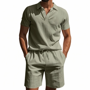Detailed texture of men's breathable linen polo shirt and drawstring shorts in sage green