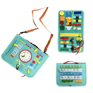 Turquoise felt busy board for kids featuring alphabet, clock, and life skill activities