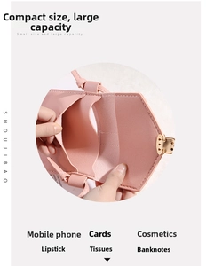 Pink faux leather phone bag detail featuring multiple inner compartments and gold clasp
