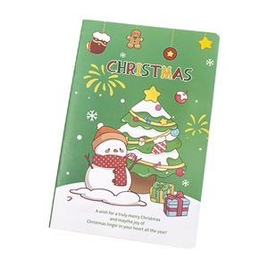 Carnet A5 de Noël vert avec illustrations festives de bonhommes de neige et pain d'épice