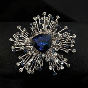 Luxury floral crystal brooch with deep blue triangle stone and sparkling rhinestones