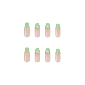 Long ballet green French fake nails with silver rhinestone chain accents on white background