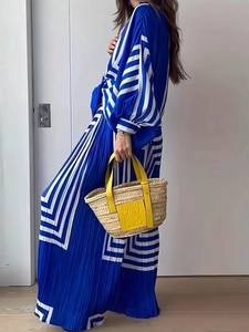 Women's blue and white striped pleated two-piece set with long sleeve shirt and wide leg pants