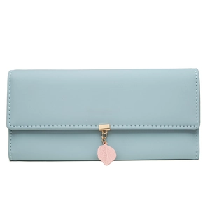 Detail view of light blue PU leather wallet with pink leaf pendant and gold hardware