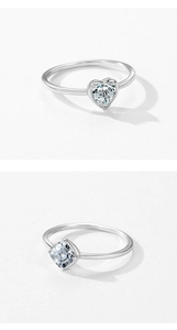 Detail showing S925 sterling silver rings with heart and cushion-cut cubic zirconia
