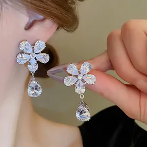 Elegant silver flower drop earrings with sparkling pear-cut zircon stones for women