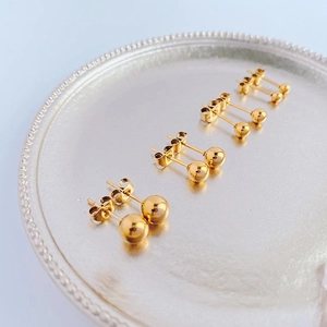 Minimalist gold titanium steel ball stud earrings set in four various sizes for women
