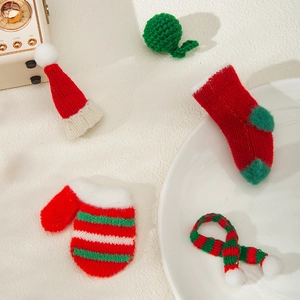 Handcrafted miniature knitted Christmas hat, scarf, glove and sock set for holiday decor