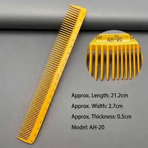 Detailed view of yellow hair cutting comb with precise 21cm scale markings and model AH-20