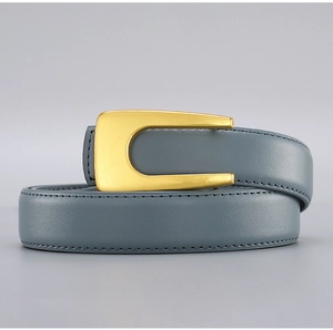 Close-up of slim blue leather belt featuring a matte gold U-shaped buckle and fine stitching