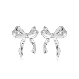 Elegant silver bow stud earrings with a polished finish and realistic shadow effect