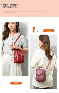 Detail view of multi-compartment Oxford fabric bags showing red and pink crossbody options