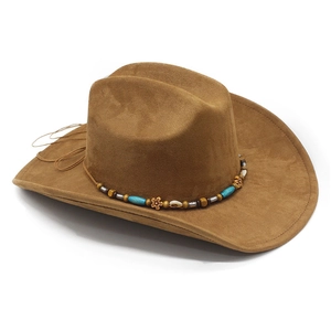Detailed view of brown suede cowboy hat with ethnic beads and metal flower charms