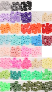 Flat lay of colorful 4000pcs clay heishi beads in various vibrant colors for DIY jewelry