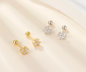 Detailed view of S925 silver flower stud earrings with zircon stones and screw ball backs