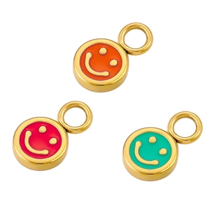 Detailed view of colorful enamel smiley face pendants in gold plated metal finish