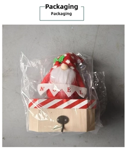 Packaged Christmas gnome candy box with Noel flag in a clear protective OPP bag