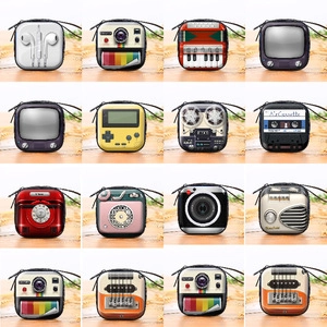Grid view of various retro-designed tinplate coin purses for earphones and small items